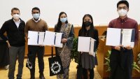 Graduates of the study program M.Sc. Photonics with their master's certificates